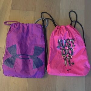 Nike Pink Drawstring Bag with 'Just Do It' Print and Purple UA Drawstring Bag